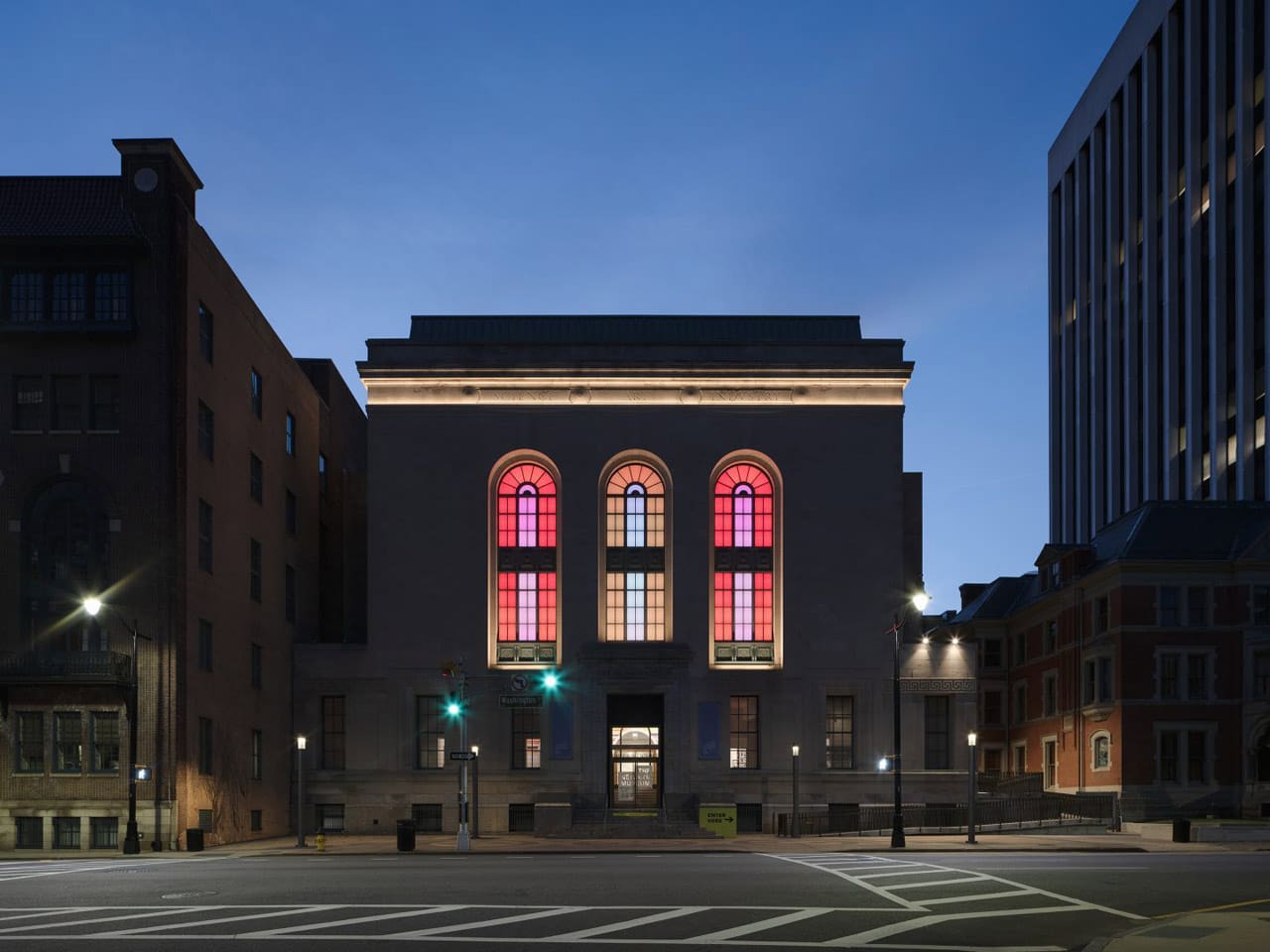 Phillip K. Smith III’s Three Half Lozenges, 2017-2021 Existing historic windows, alupoly, aluminum, LED lighting, electronic components, unique color choreography. Photo by Lance Gerber.