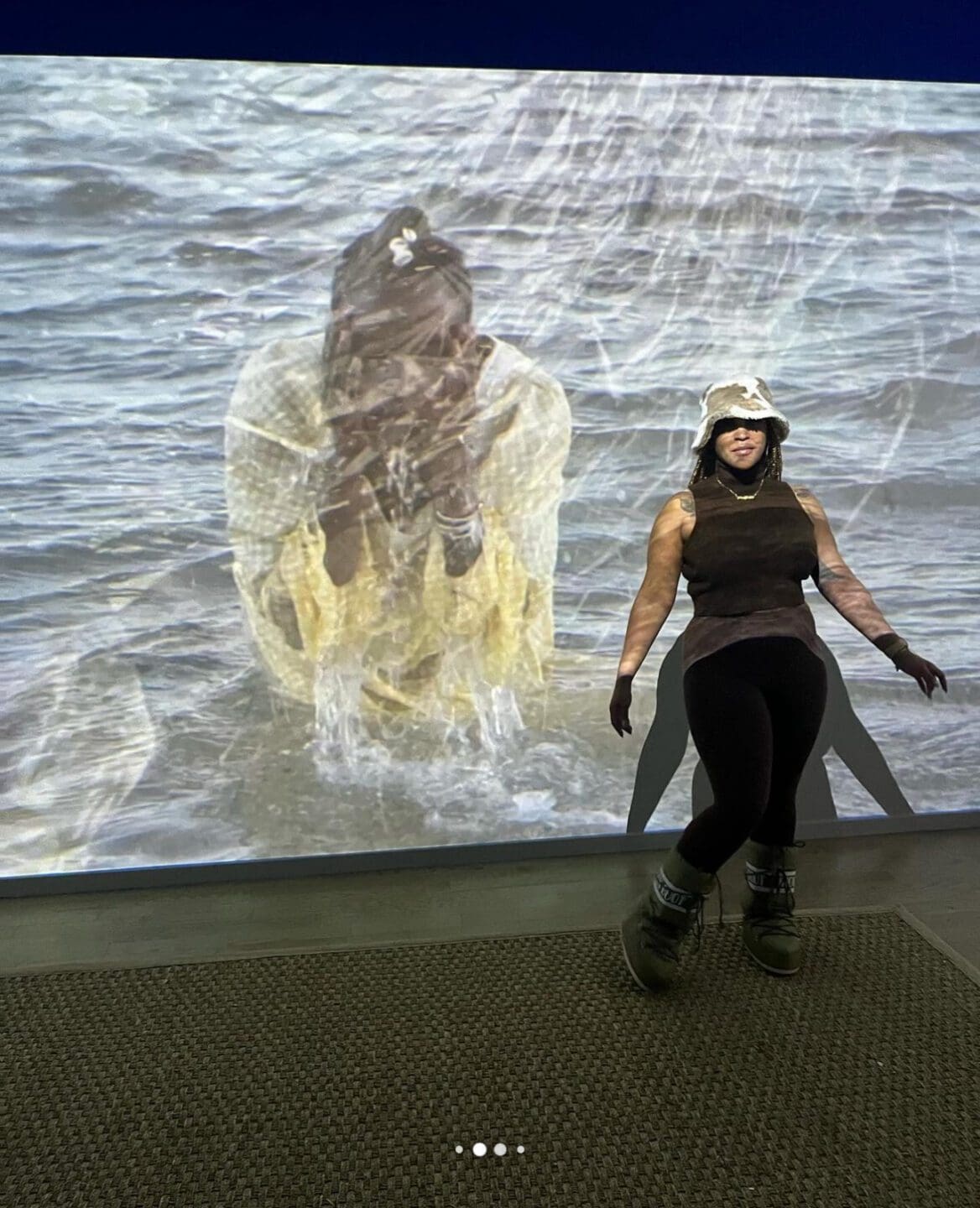 Adama Delphine Fawundu: In the Spirit of Àṣẹ  exhibit visitor