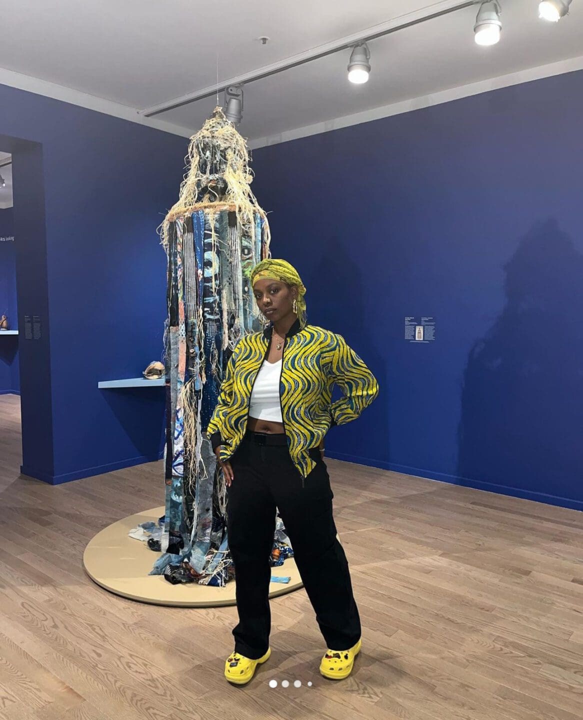 Adama Delphine Fawundu: In the Spirit of Àṣẹ  exhibit visitor