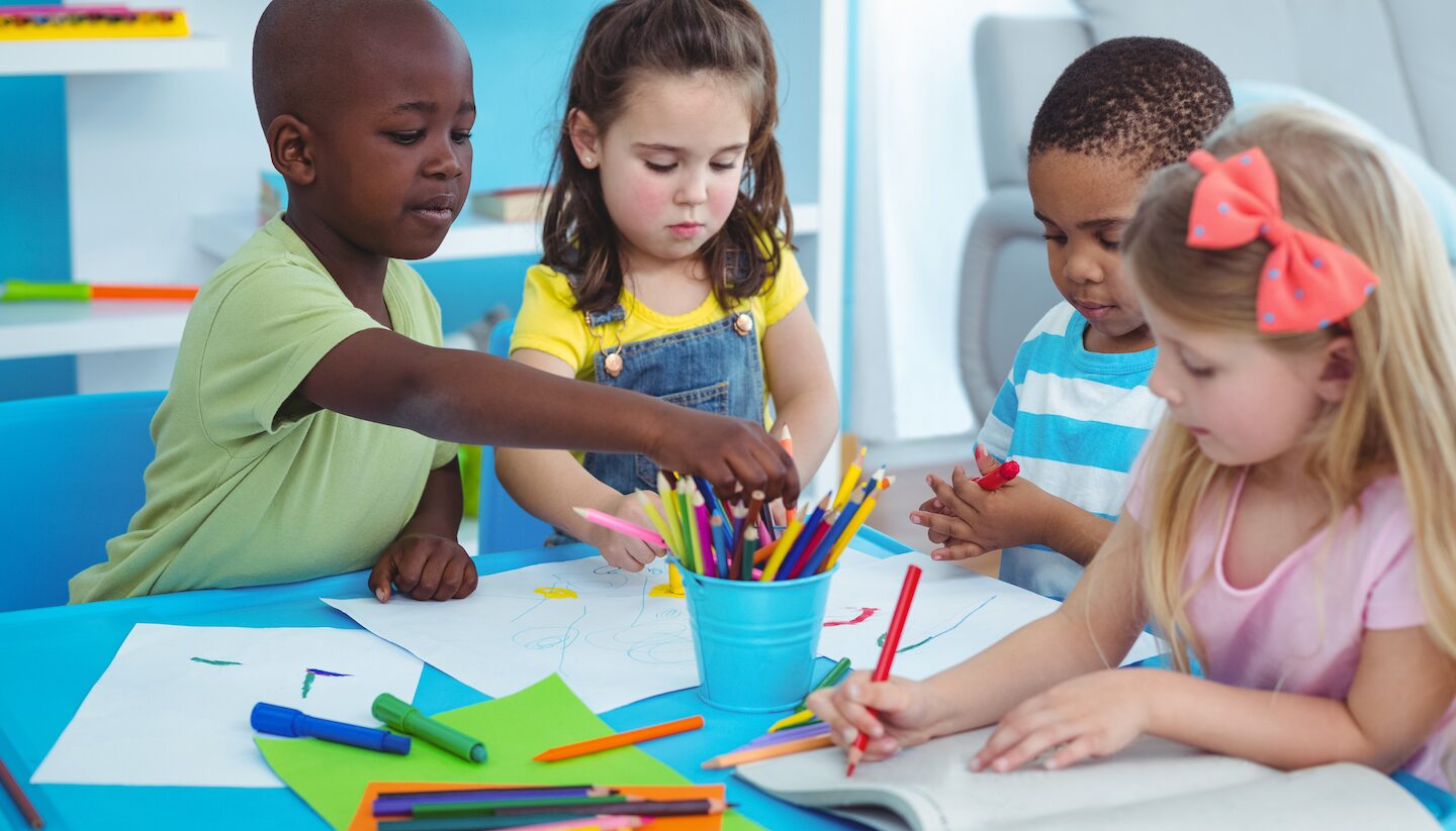 kids drawing with colorful markers